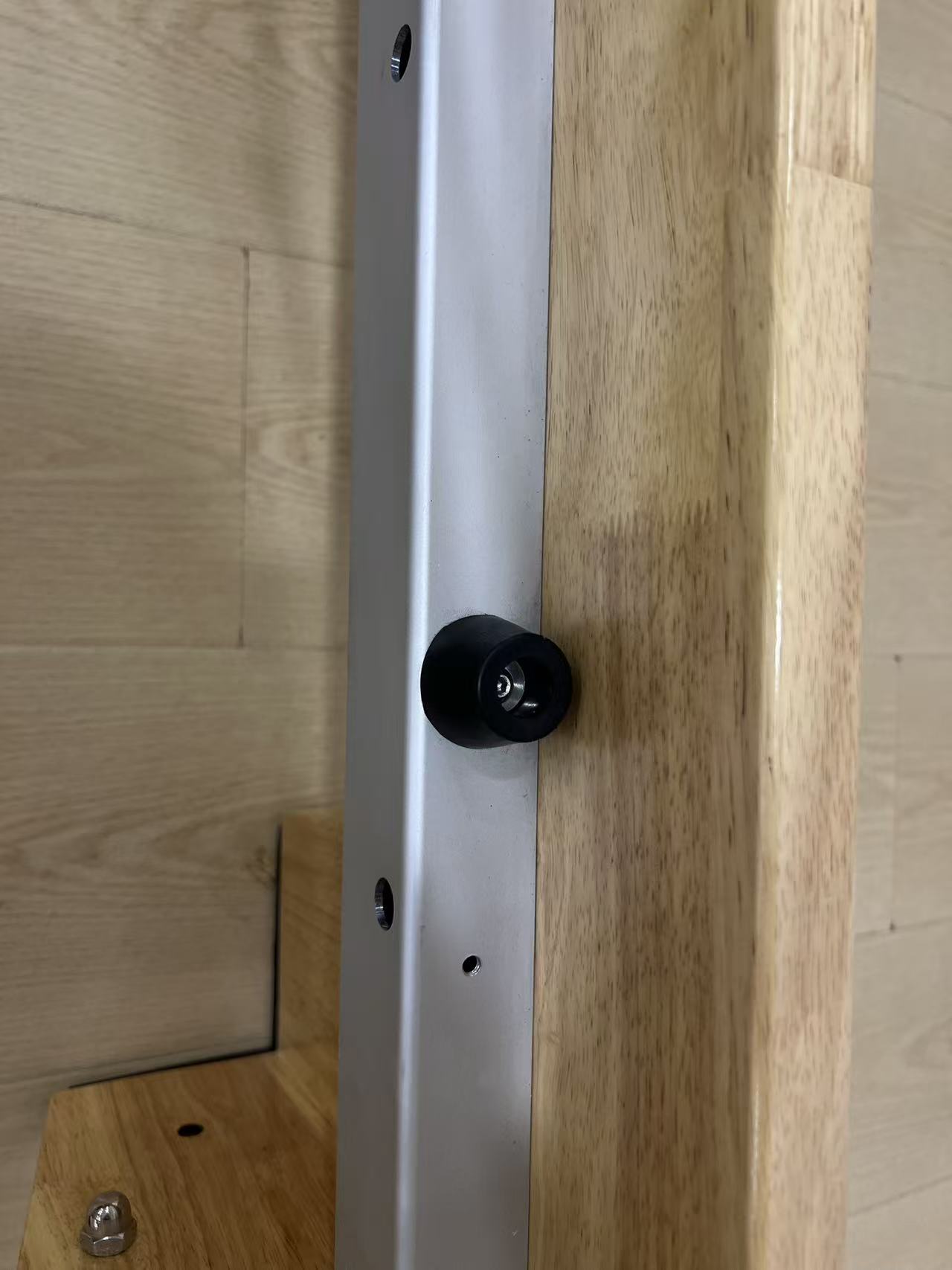 Close-up of an Atuspilates aluminum alloy reformer track